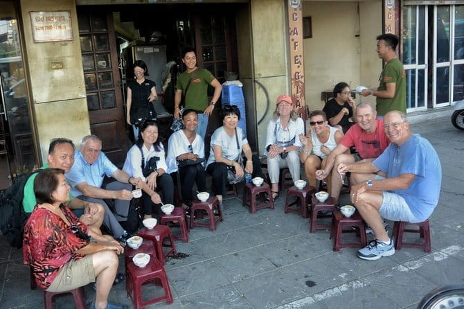 Hanoi Michelin Star Food Tour Via Jeep, Vespa or Motorbike - Hanoi Train Street after dark