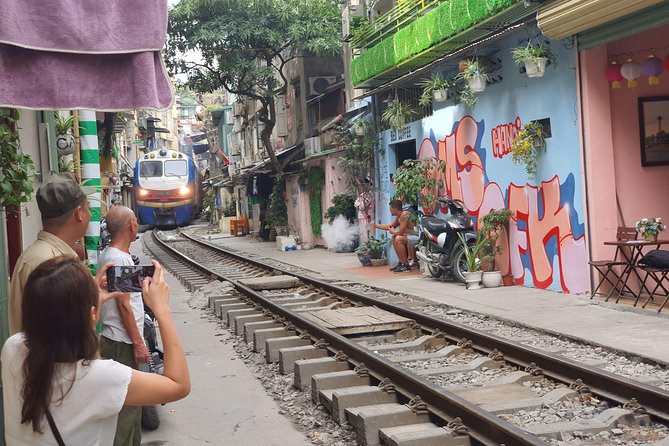 Hanoi Motorbike Tour: Food, Culture and Fun by Vintage Motorbike - Long Bien Bridge and Red River views