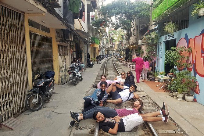 Hanoi Motorbike Tour: Food, Culture and Fun by Vintage Motorbike - Train Street, coffee, and a famous city scene