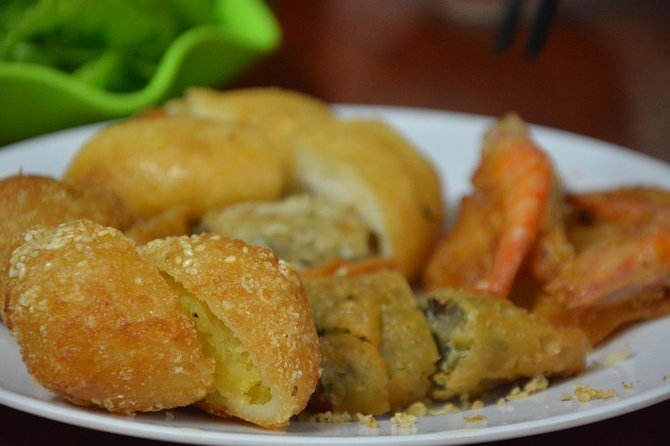 Hanoi Motorbike Tours Led By Women: Hanoi By Night Foodie Motorbike Tours - The 6 p.m. start in the Old Quarter