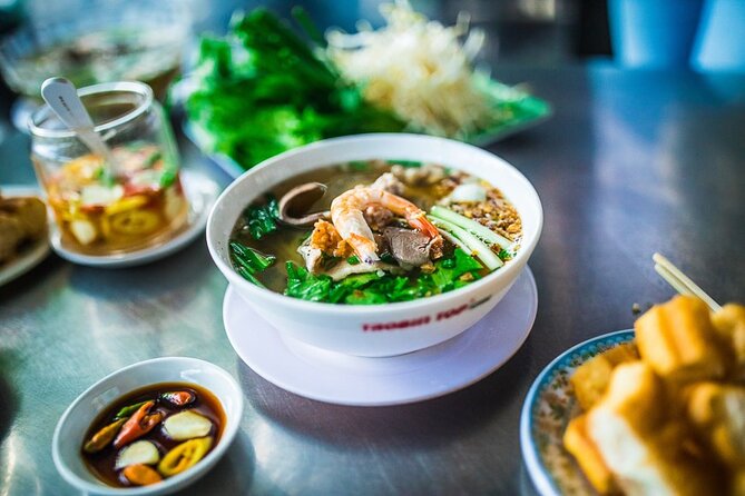 Hanoi Street Food Tour By Motorbike + Sightseeing SAFE & FUN - Aunt Tu’s snails and the open views of West Lake