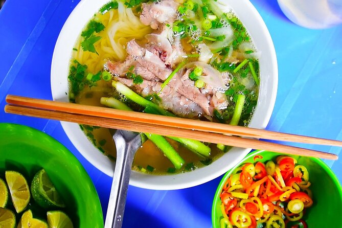 Hanoi street food tour (Private tour) - Dong Xuan Market shows Hanoi’s working side