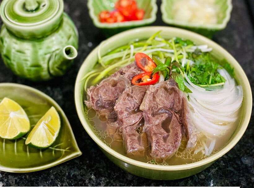 Hanoi: Street Food Tour with Train Street & Hidden Alleyways - First tastes: dry mixed pho and Hanoi-style banh my
