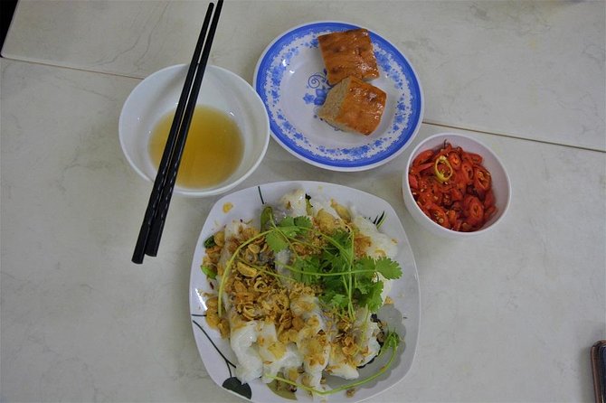 Hanoi Vespa Tours: Hanoi After Dark Vespa Food Tours - The railway area and Hanoi’s changing cityscape