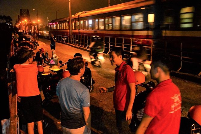 Hanoi Vespa Tours: Hanoi After Dark Vespa Food Tours - Riding a Vespa through Hanoi at night