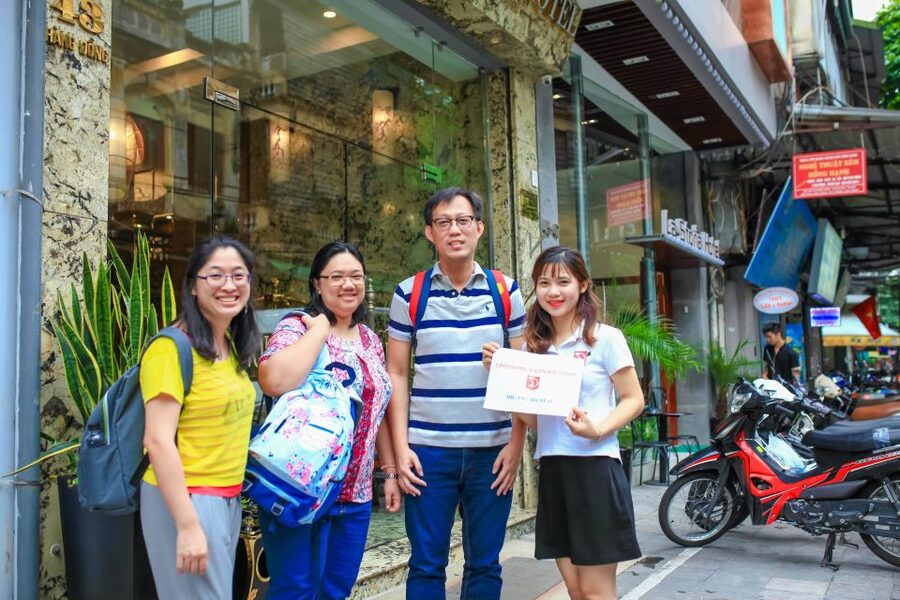 Hanoi Walking Street Food Tour & Cyclo Ride - Banh mi in a small local stop