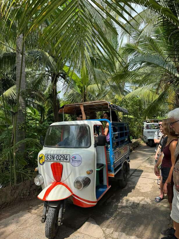 HCM: Mekong Delta Islands Boat & Tuk-Tuk Tour with Tastings - Reaching My Tho through the rice fields