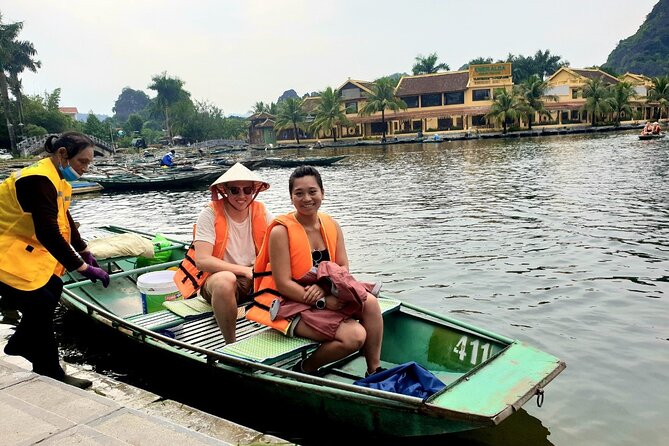 Highlight Ninh Binh Full Day Tour Tam Coc Boat, Mua Cave, Hoa Lu - Tam Coc by bamboo boat for about 90 minutes