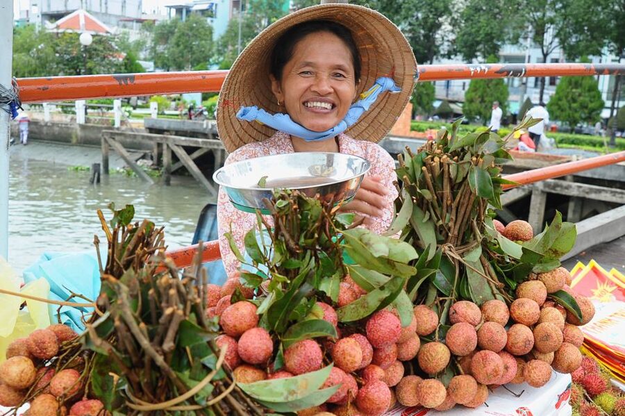 Ho Chi Minh City: Discover Mekong Delta & Coconut Village - A sampan through coconut-lined canals