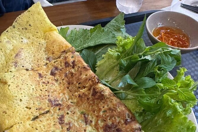 Ho Chi Minh City Food Tour with 8+ Authentic Local Tastings - A food tour that uses central Saigon as its dining room