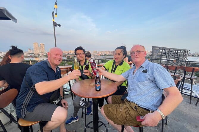 Ho Chi Minh City Food Tour with 8+ Authentic Local Tastings - Book Street, local culture, and a refreshing drink