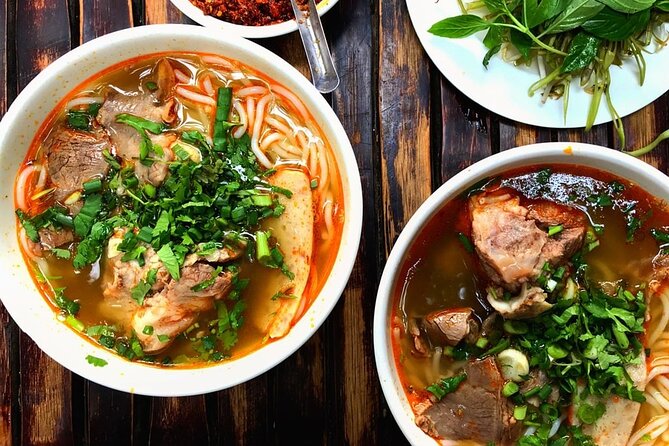Ho Chi Minh City Street Food Tour & Sightseeing By Motorbike - Starting with bún bò Huế in District 3