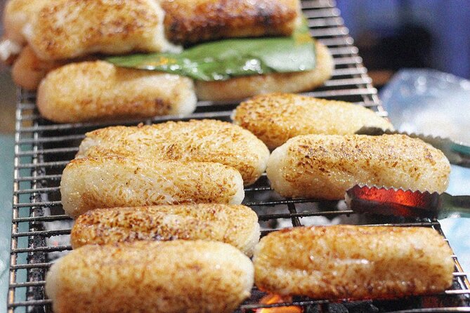 Ho Chi Minh City Street Food Tour & Sightseeing By Motorbike - Bánh khọt among the Nguyen Thien Thuat apartments