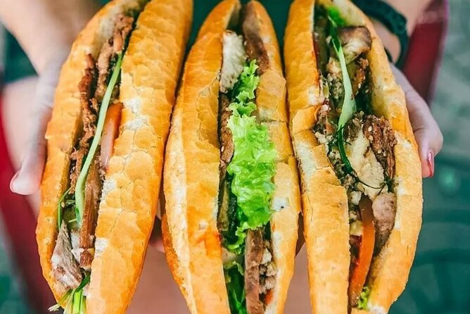 Ho Chi Minh City Street Food Tour & Sightseeing By Motorbike - Cambodian Market for crackers and local flavor