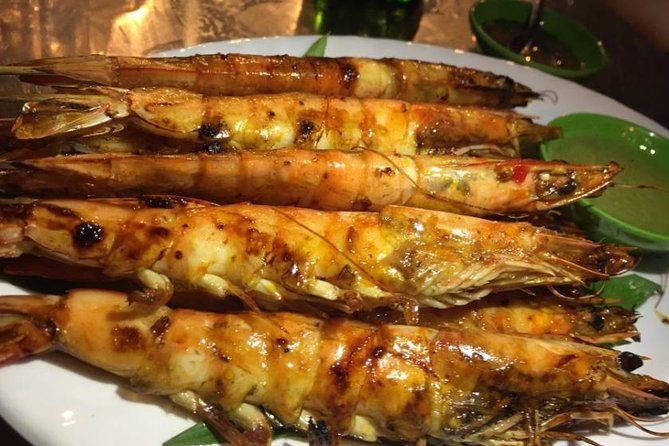 Ho Chi Minh City: Street Food Walking Tour with 12 Tastings - Stop one: 12 Vietnamese foods and drinks