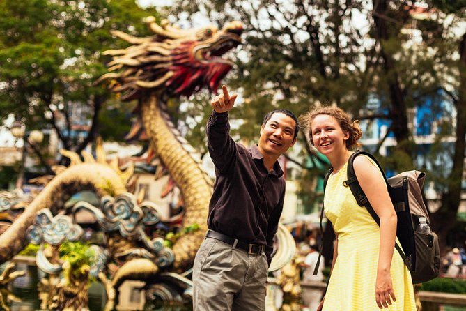 Ho Chi Minh: PRIVATE Off the Beaten Track Tour with a Local - Street art, vendors, and ordinary city corners