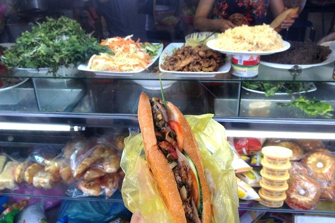 Hoi An at Sunset: Authentic Local Street Food Tour - BBQ pork, rice paper, and the local way to assemble a bite