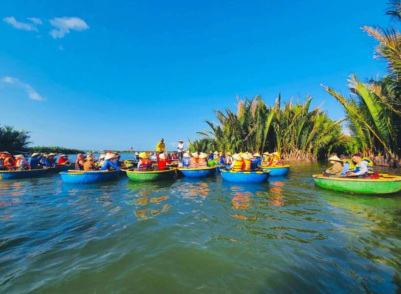 Hoi An: Coconut Basket Boat Rides with Two-way Transfers - Learning to paddle, then joining the race