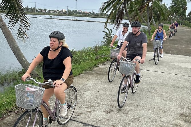 Hoi An countryside cycling Tour,Basket Boat-organic farming-lunch - Bay Mau Coconut Forest and the round basket boat