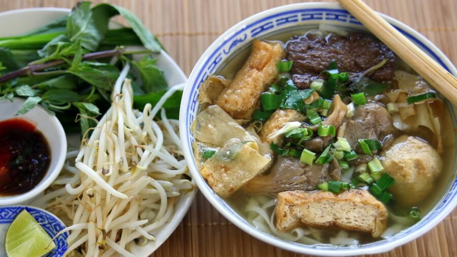 Hoi An/Da Nang: Vegetarian Cooking Class & Basket Boat Ride - Cooking four Vietnamese dishes
