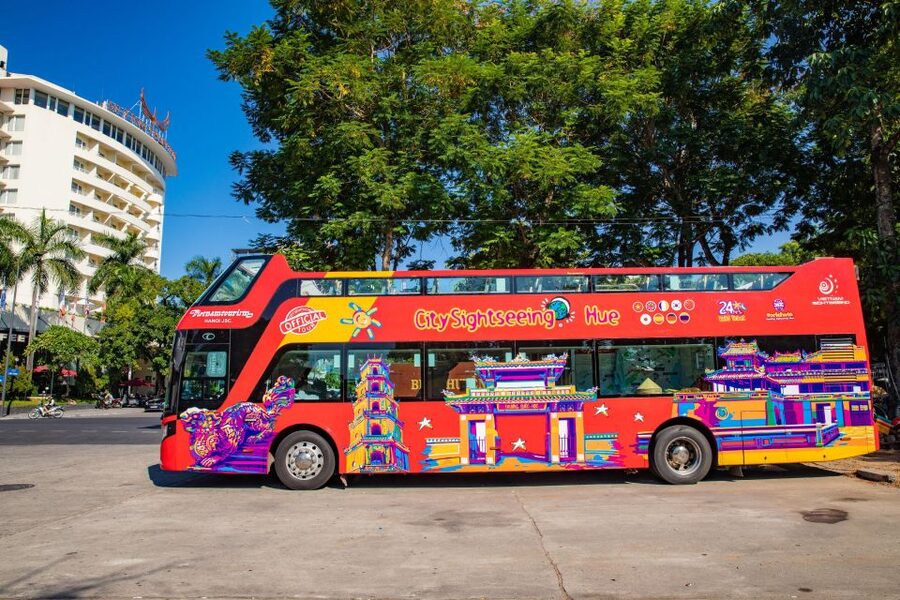 Hue: City Sightseeing Hop-On Hop-Off Bus Tour - Quoc Hoc Hue brings the route back toward the city
