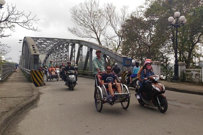 Hue Flavor Street Food Tour - Riding through Hue by cyclo