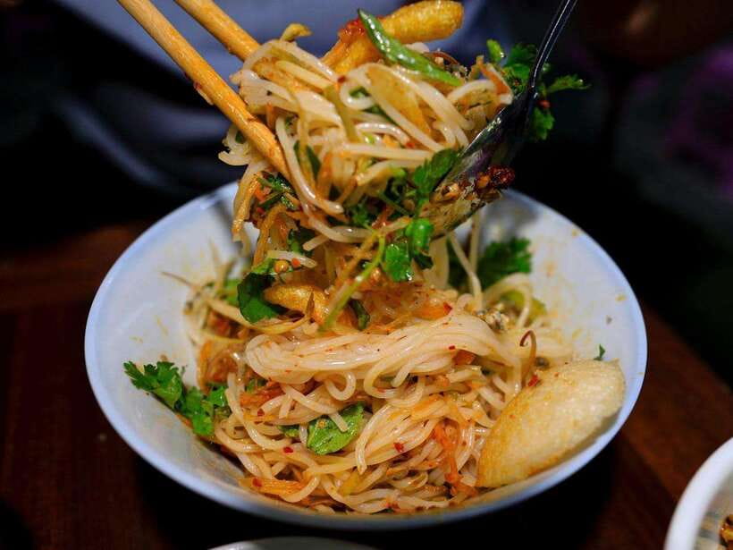Hue: Guided Local Food Tour with Stories - The first stop on Phan Dinh Phung Street
