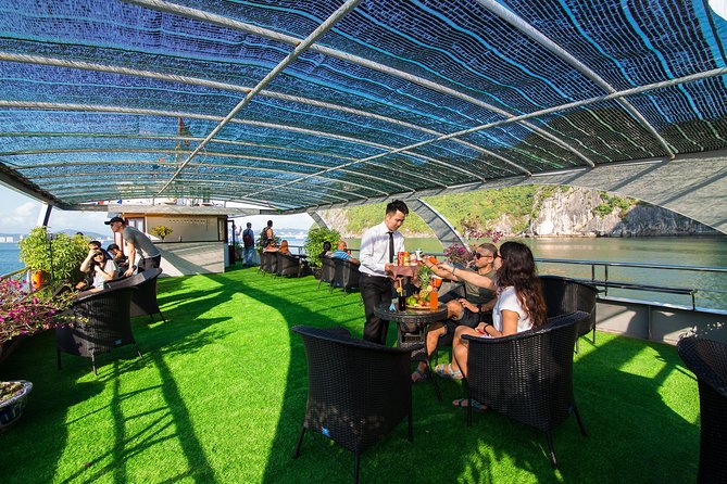 Luxury Halong Bay 1 Day on Cruises From Hanoi with Bus & Lunch - Titov Island, swimming, and the bay views