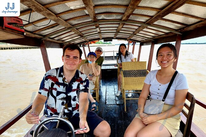 Mekong Delta 'Cai Rang' Floating Market 2-Day Tour - Cai Be by boat, with fruit and coconut juice