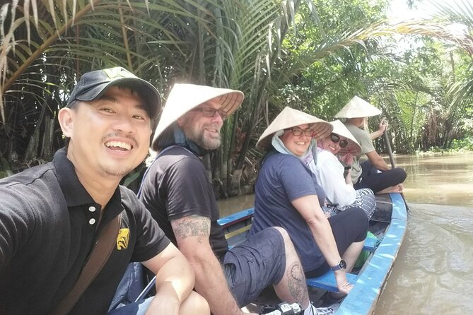 Mekong Delta Full Day Trip - My Tho & Ben Tre - VIP Private Tour - The rowing boat through a narrow canal