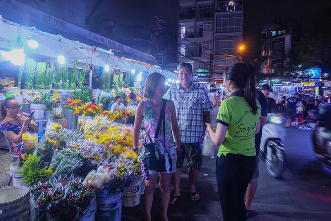 Morning Saigon Unseen+Street Food Tour with Ao Dai Riders Option - Coconut juice beside a floating market