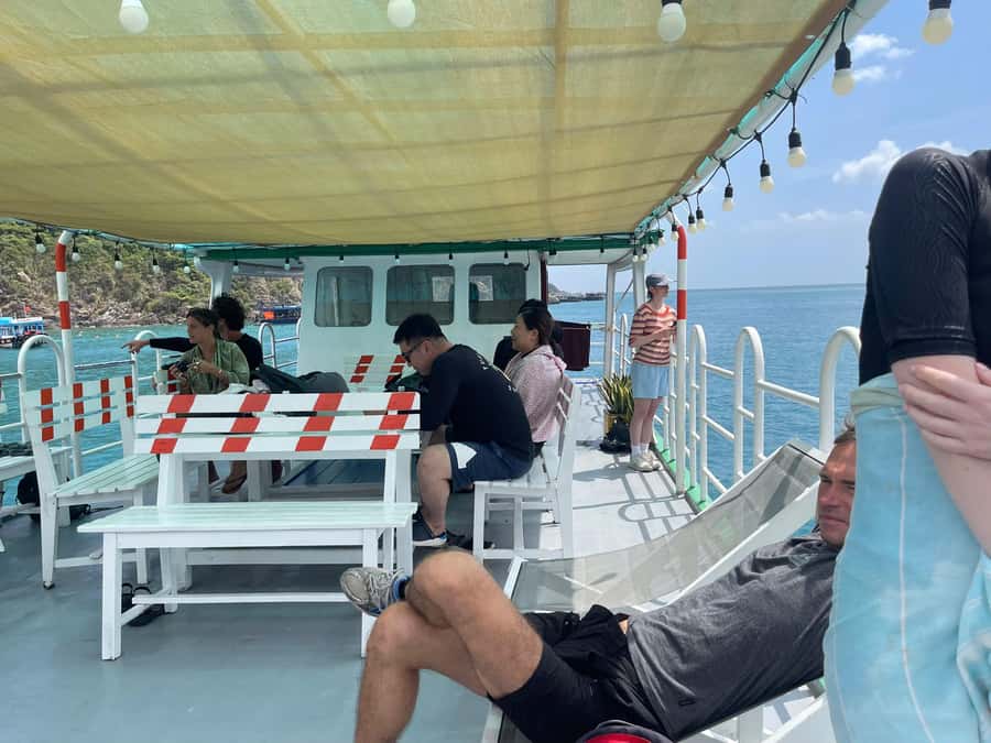 Nha Trang: Snorkeling Tour with BBQ Lunch at Coral Reef - The snack break with tea, coffee, fruit, and rice cake