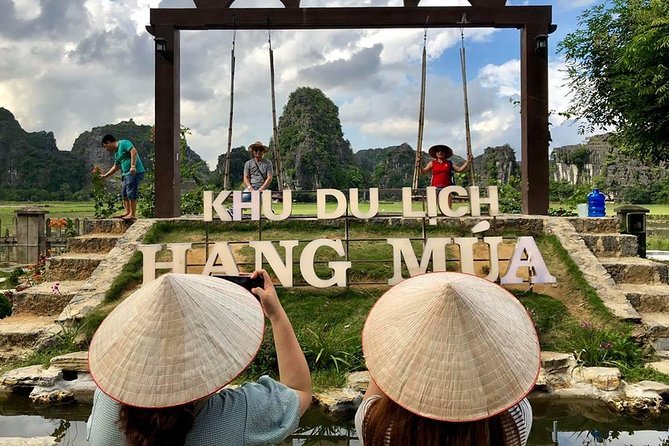 Ninh Binh Daily Tour: Hoa Lu -Mua Cave -Tam Coc- Bike-Swimming with Sunset Party - Mua Cave and the 500-step climb