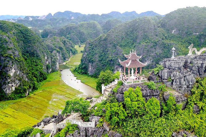 Ninh Binh Daily Tour: Hoa Lu -Mua Cave -Tam Coc- Bike-Swimming with Sunset Party - Tam Coc by sampan boat