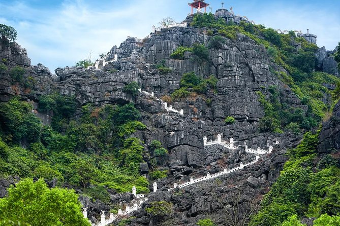 Ninh Binh Daily Tour: Hoa Lu -Mua Cave -Tam Coc- Bike-Swimming with Sunset Party - Lunch, swimming, and the sunset gathering
