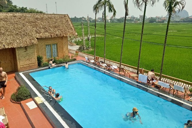 Ninh Binh Daily Tour: Hoa Lu -Mua Cave -Tam Coc- Bike-Swimming with Sunset Party - What the $79 price really includes