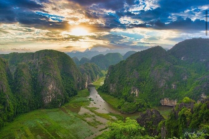 Ninh Binh Day Tour Tam Coc Mua Cave Hoa Lu Buffet Lunch Limousine - Climbing 500 steps at Mua Cave