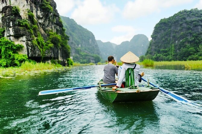 Ninh Binh Day Tour To Visit Hoa Lu - Trang An/Tam Coc - Mua Cave - Cycling through villages and rice fields