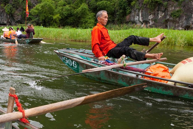 Ninh Binh Full Day Tour to Hoa Lu Tam Coc Mua Cave Buffet Lunch - Tam Coc by sampan through three grottos