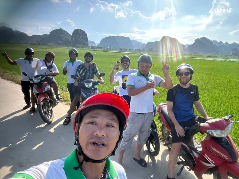 Ninh Binh: Trang An Boat Ride, Bich Dong & Mua Cave Sunset - Riding through villages, fields, and river country