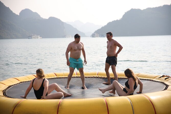 Oasis Bay Party Cruise 3 Days 2 Nights - Ha Long Bay Tour - Kayaking, swimming, and sunset fun on the first day