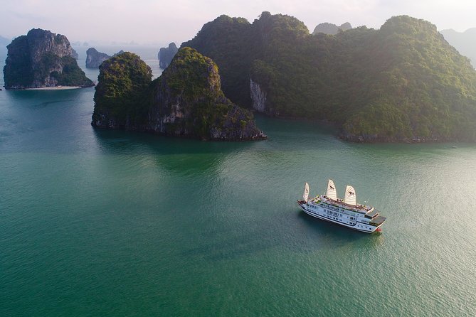 (Official) Signature Halong Cruise - 03 days 02 nights program - Boarding at 12:30 and settling into the cabin