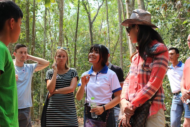 Premium Cu Chi Tunnels Tour with Local Expert by SpeedBoat - Entering the tunnel network