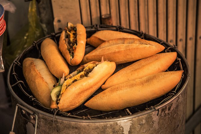 Private Hoi An Evening Food Tastings Tour by Bike - Crossing toward Cam Nam for bánh xèo and BBQ
