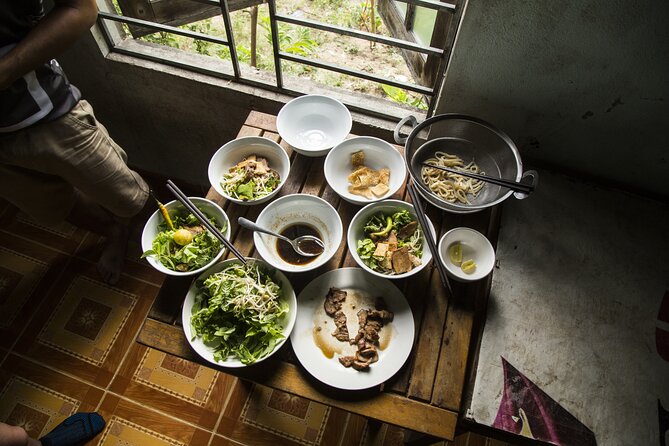 Private Hoi An Evening Food Tastings Tour by Bike - Tra Que Vegetable Village and the first serious meal