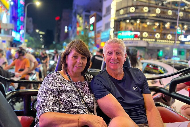 Private Jeep City Tour Saigon by Night and Skybar Drink - Dong Khoi and Nguyen Hue show two sides of central Saigon