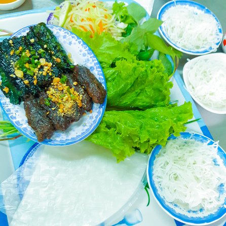 Private Street Food Evening Walking Tour in Ho Chi Minh City - Six to ten stops, with room for local specialties