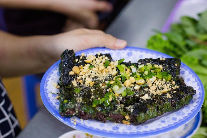 Private Street Food Evening Walking Tour in Ho Chi Minh City - District 3, District 10, and the flower market