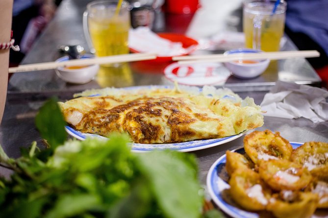 Private Street Food Motorbike Tour in Ho Chi Minh City - District 4: seafood, dessert, and the final table