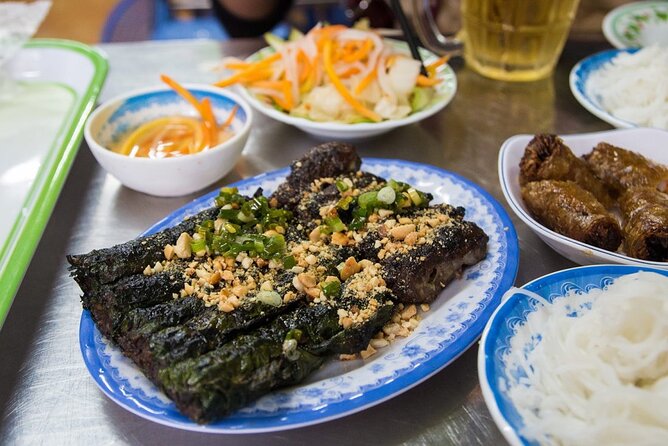 Private Street Food Tour by Motorbike in Ho Chi Minh City - Ho Thi Ky Flower Market and old Saigon atmosphere
